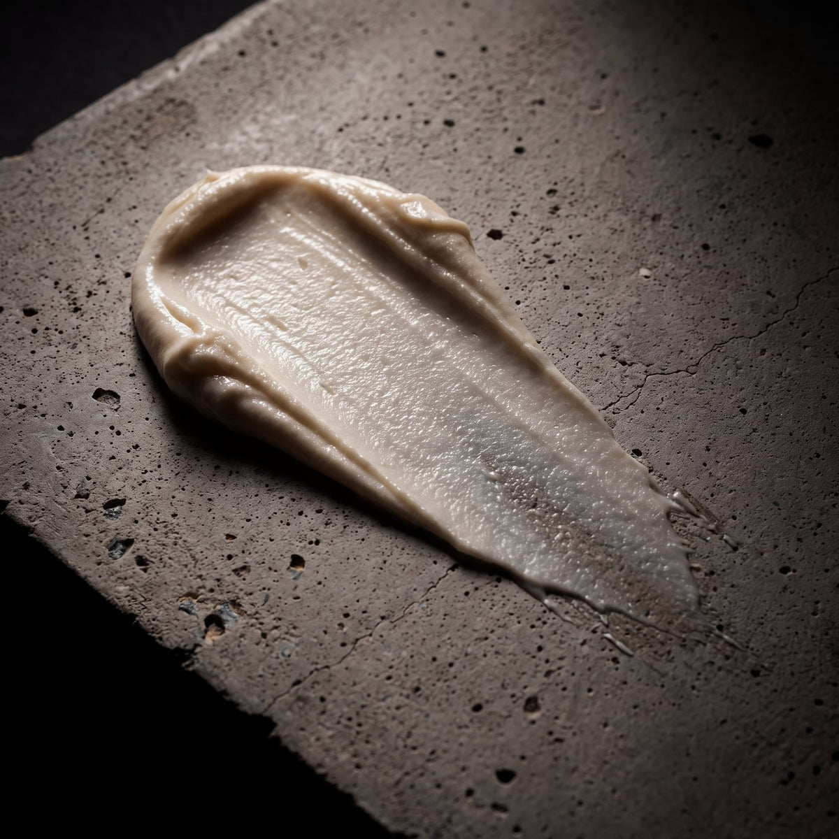 The cream, swatched on concrete